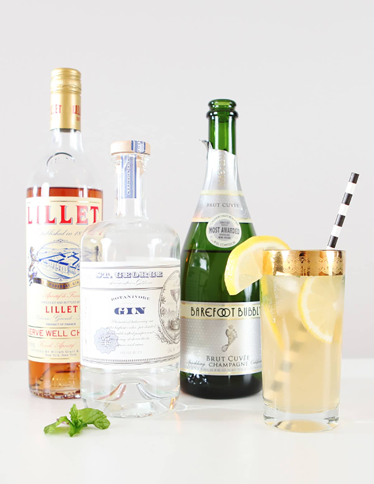 Champagne Smash Cocktail Recipe perfect drink for New Year's Eve all you need is gin, Lillet Rose and champagne! 