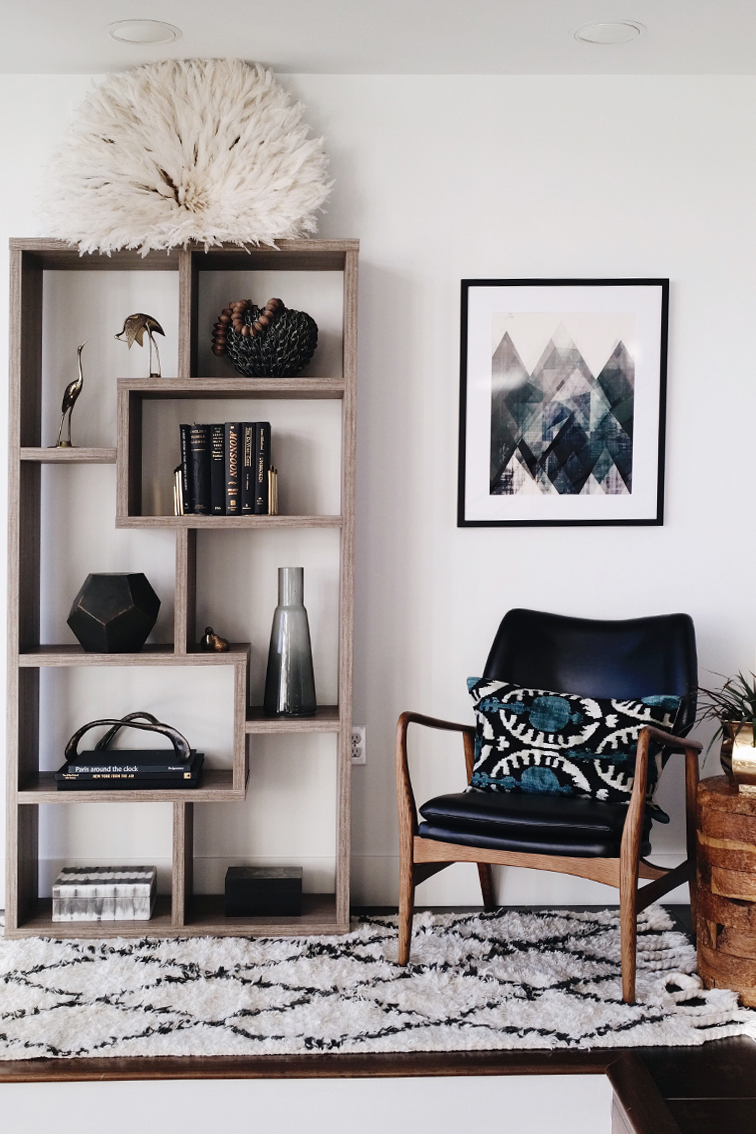 Gorgeous shelf styling vignette with juju hat. I love the neutrals and Mid Century Modern inspired design. Seattle Showhouse. Interior design by Decorist with ATGstores.com and Porch. Click to see more of the house on House Of Hipsters blog. 