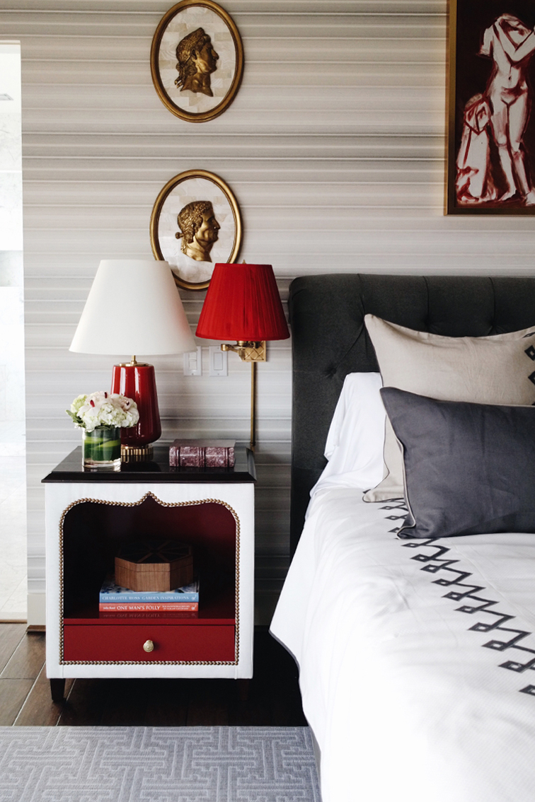 Master bedroom in the Seattle Showhouse. Love the bold red and more traditional yet modern design. 