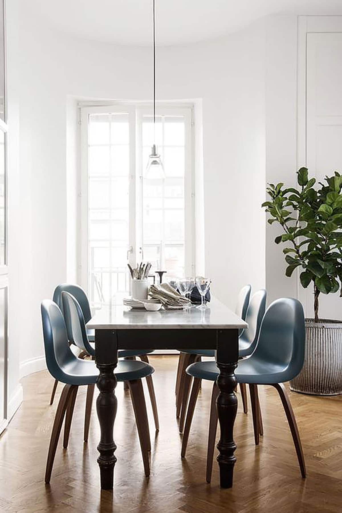 Antique dining table in modern deals house