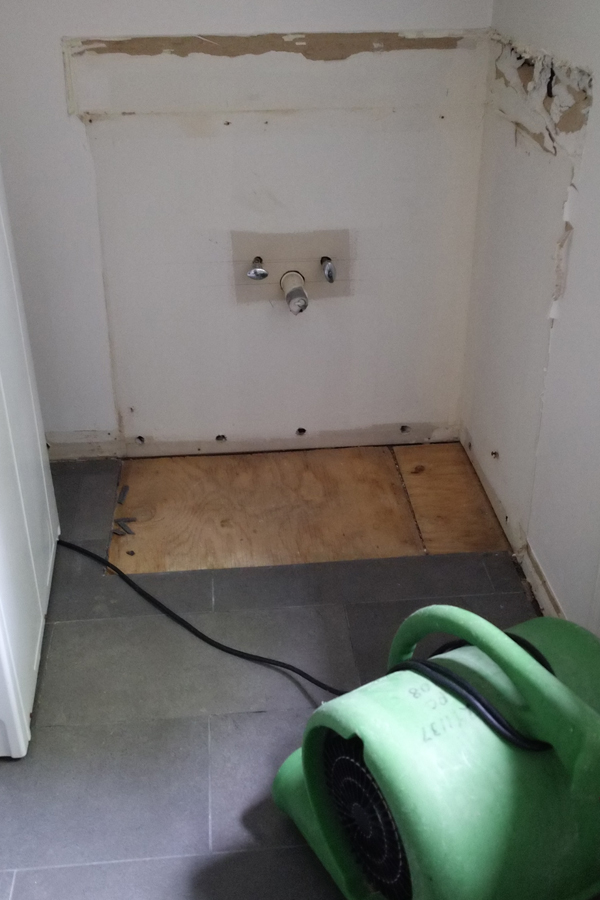 Sudden water damage insurance claim and why we chose luxury vinyl flooring for the basement.
