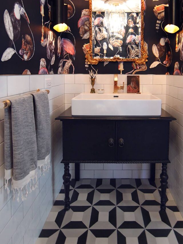 Eclectic bathroom makeover with bold black wallpaper