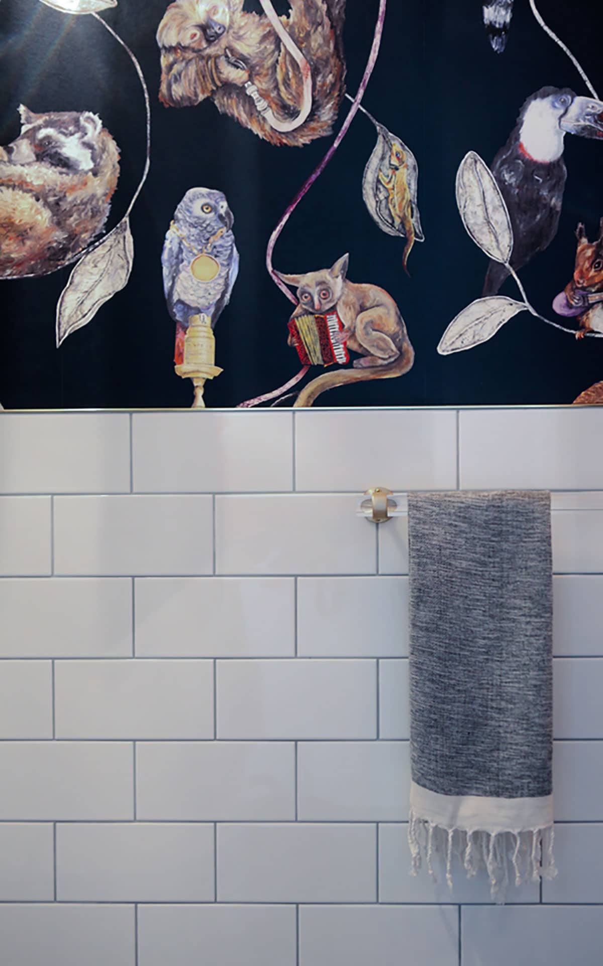 House of Hackney Midnight Empire wallpaper with white subway tile
