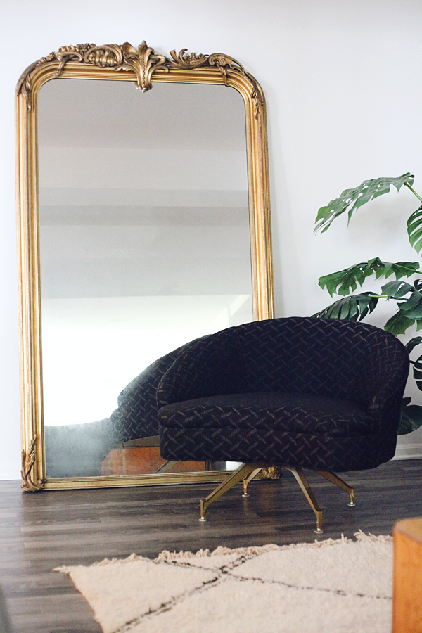 Decorating with a large vintage ornate gold gilt-style mirror from Everything But The House. I love the French girl chic modern decor