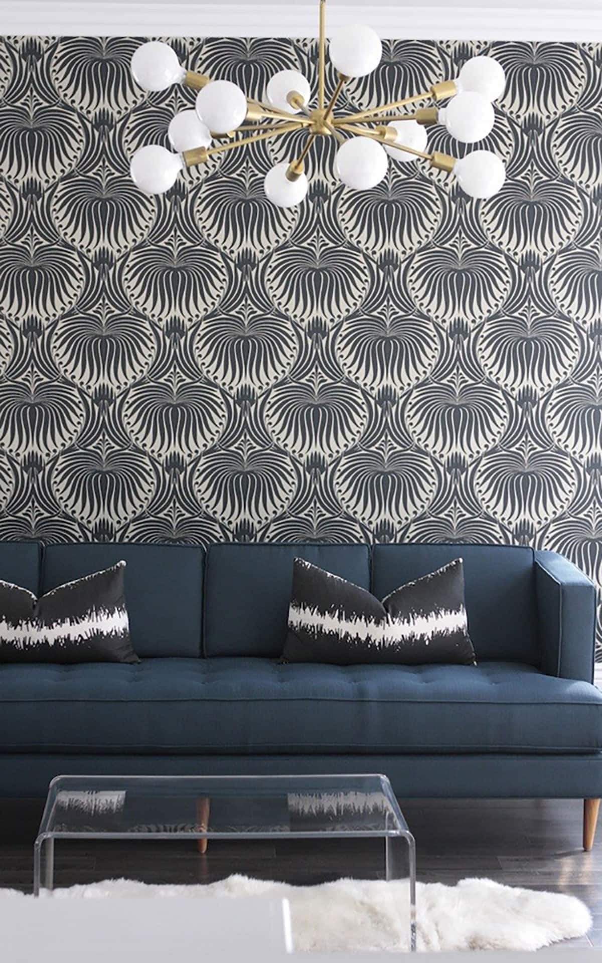 Becki Owens used Farrow and Ball Lotus wallpaper in a modern playroom.