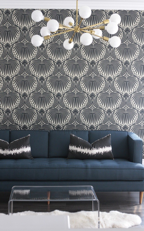 Becki Owens used Farrow and Ball Lotus wallpaper in a modern playroom.
