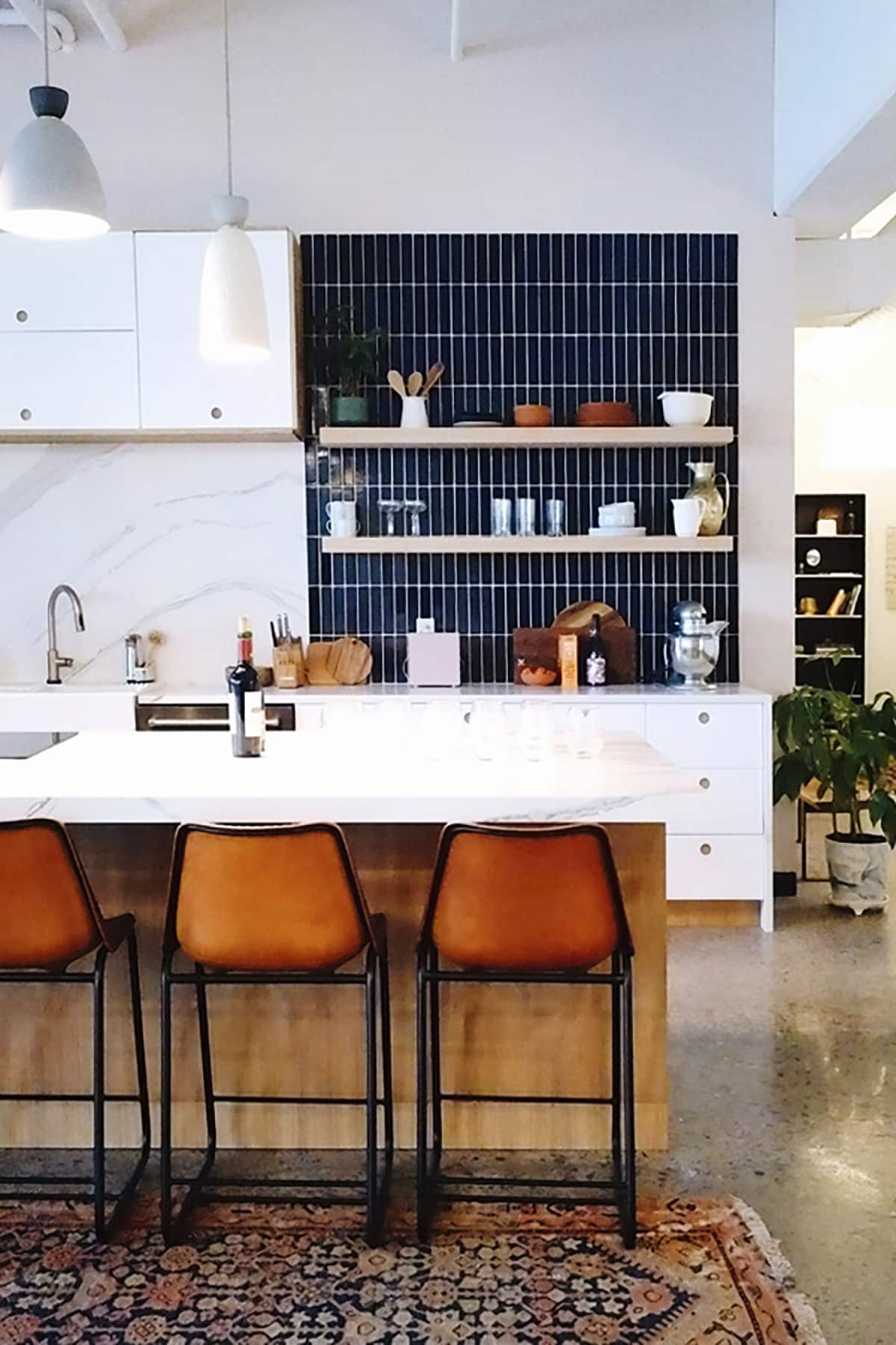 Kitchen Makeover dreaming. Waterfall island, matte black faucet, stone blackspash