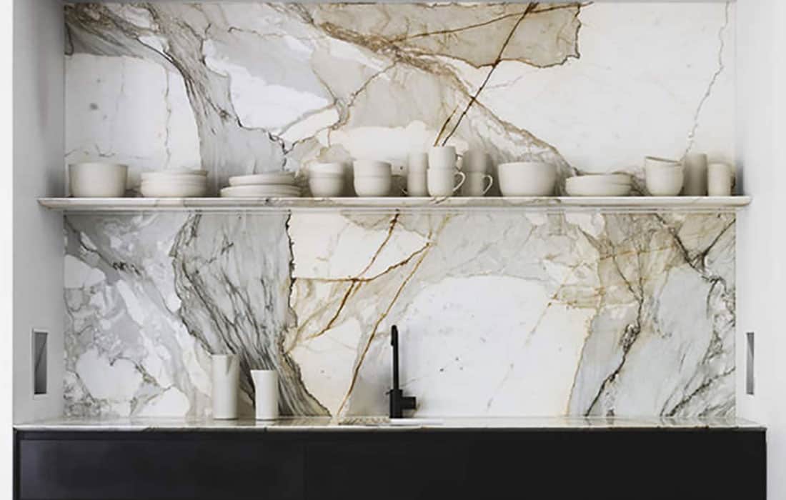 Floating marble shelf in kitchen