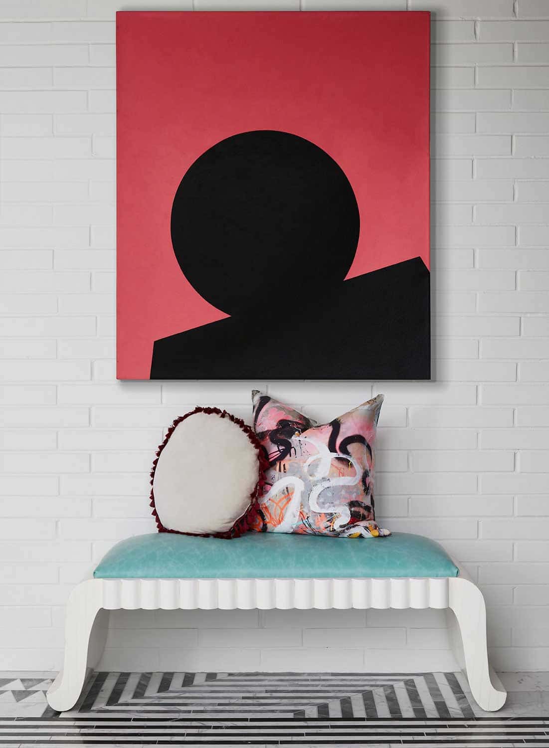 Modern 80s home decor with contemporary artwork and tile by Kelly Wearstler