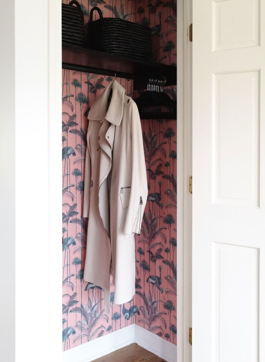 I wallpapered a closet and my guests love this little surprise when I hang their coats!