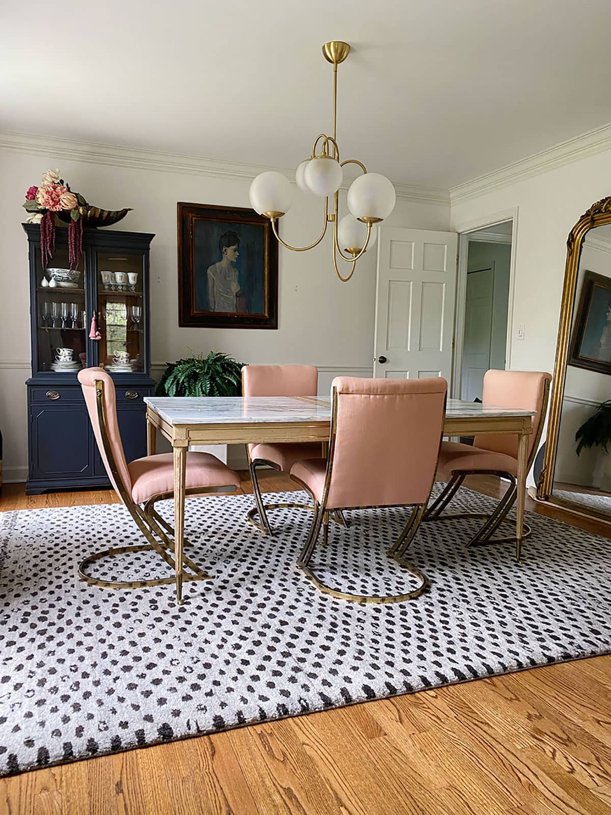 Original brass cantilever chairs by Pierre Cardin before reupholstering in Ultrasuede performance fabric