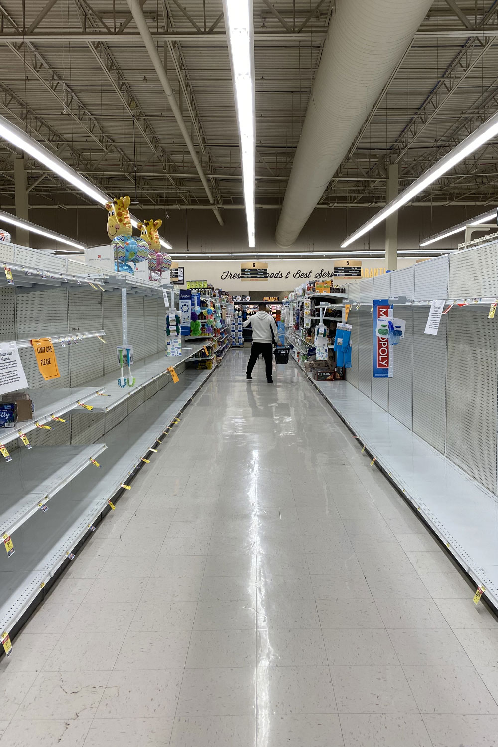 Shelves at the grocery store bare and no toilet paper