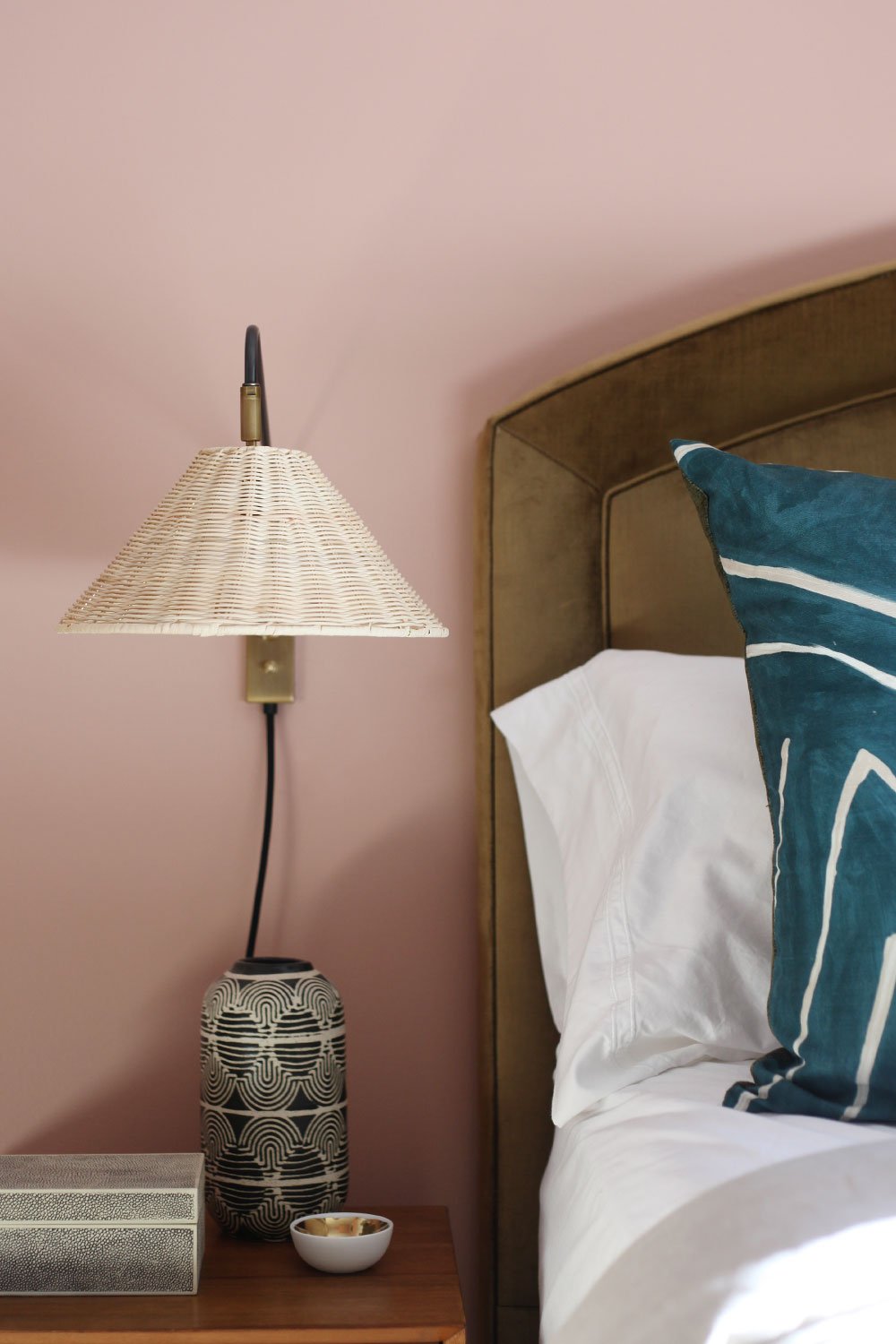 Loving this wicker shade on the Flynn wall sconce from Serena & Lily