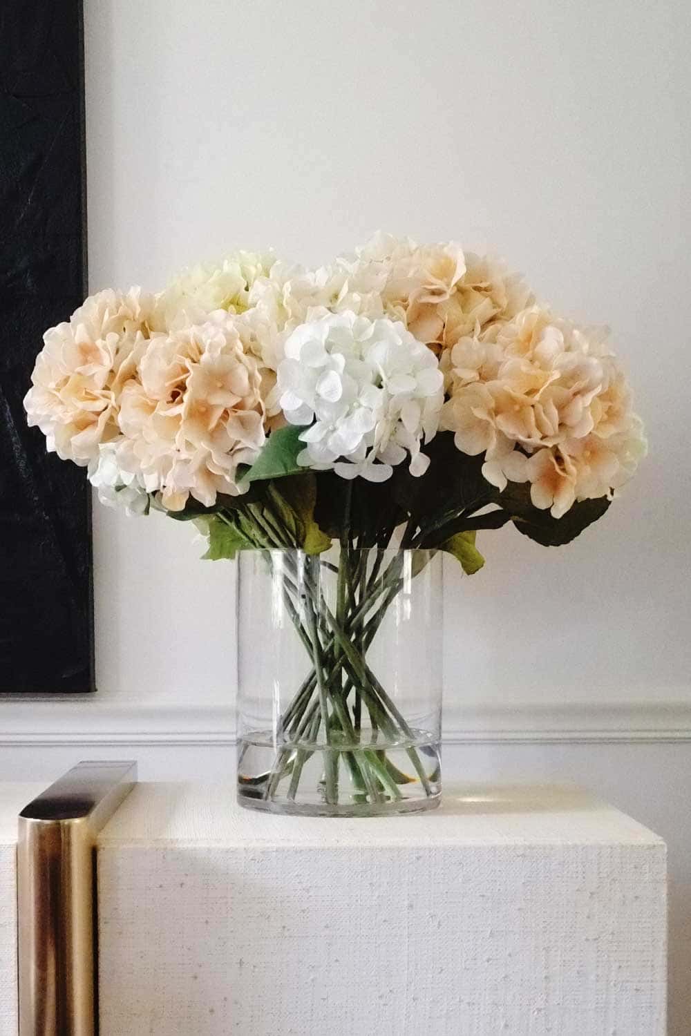 Create this DIY Artificial Flower Arrangement in glass vase using resin that looks like water - large bunch of hydrangeas