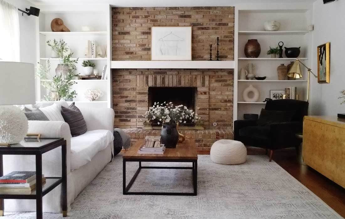 modern living room with brick fireplace