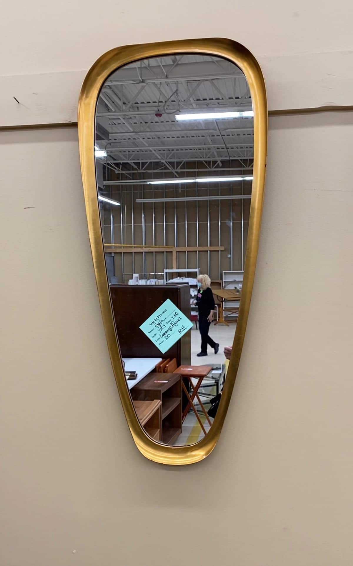 When decorating on a budget, always resell items you no longer need and check the thrift shops before buying new. I found this Vintage Mid-Century Modern LaBarge mirror found at the thrift shop for $100. 