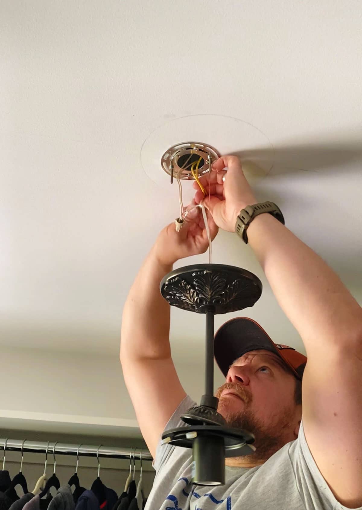 How To Change A Ceiling Light Fixture - install the new mounting plate before rewiring the new lighting