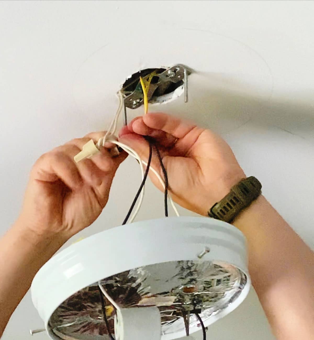 How To Change A Ceiling Light Fixture - turn power off and undo the old wiring