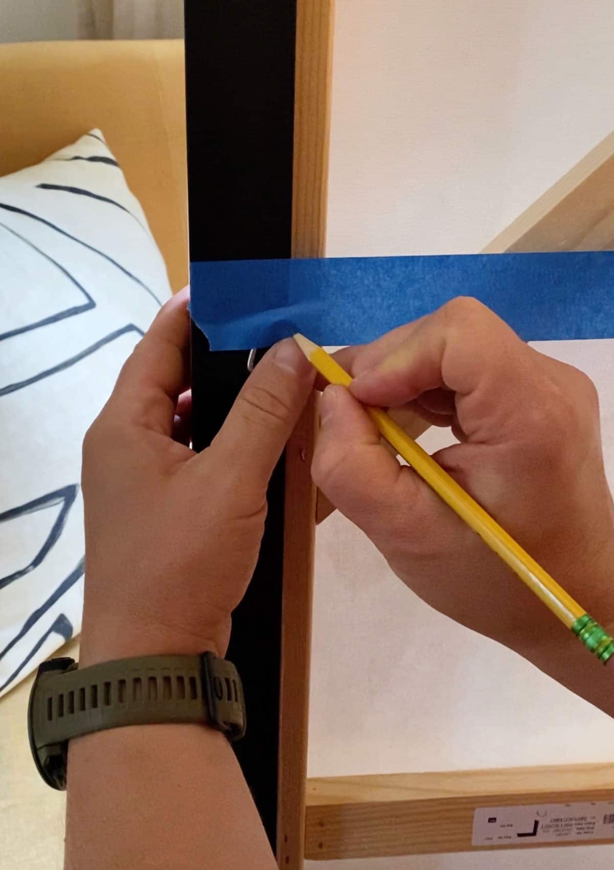 How To Hang A Picture With 2 Hooks Using Painter's Tape - Here's is the simple way to hang art with 2 hooks, painter's tape, and a level. 