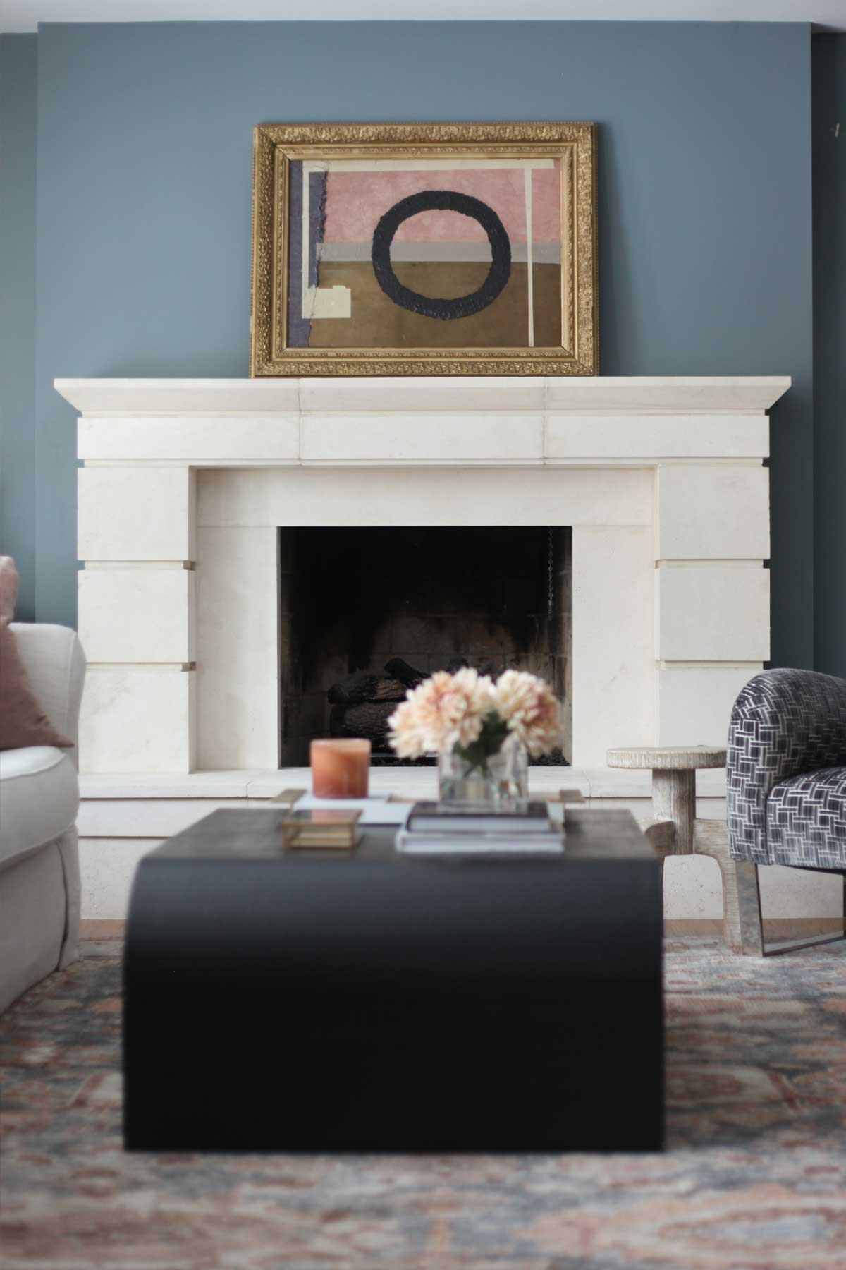 Eclectic Mantel Decor Ideas - this large statement art has a consistent color palette and makes my mantel decor vignette look cohesive. 