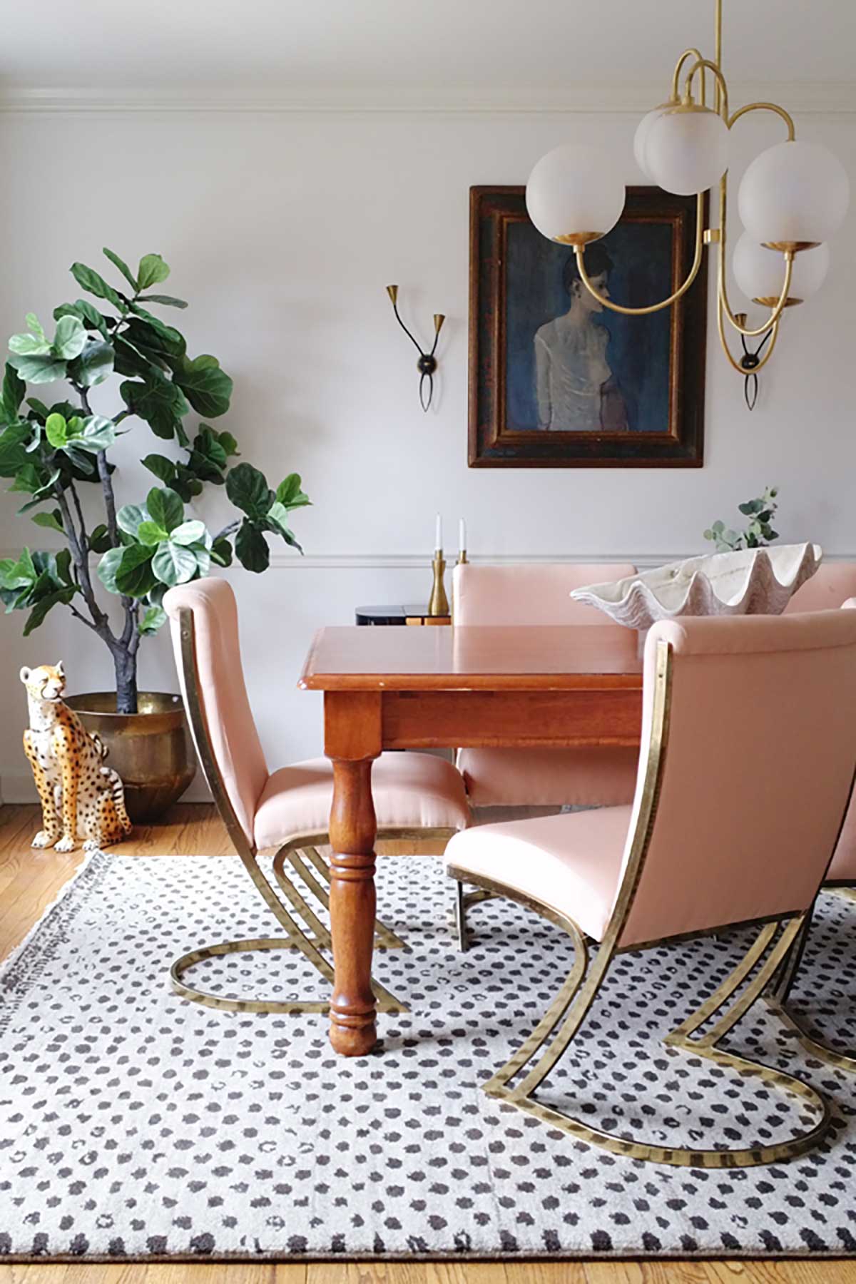 How To Decorate With Artificial Plants - faux fiddle leaf fig tree in eclectic modern dining room
