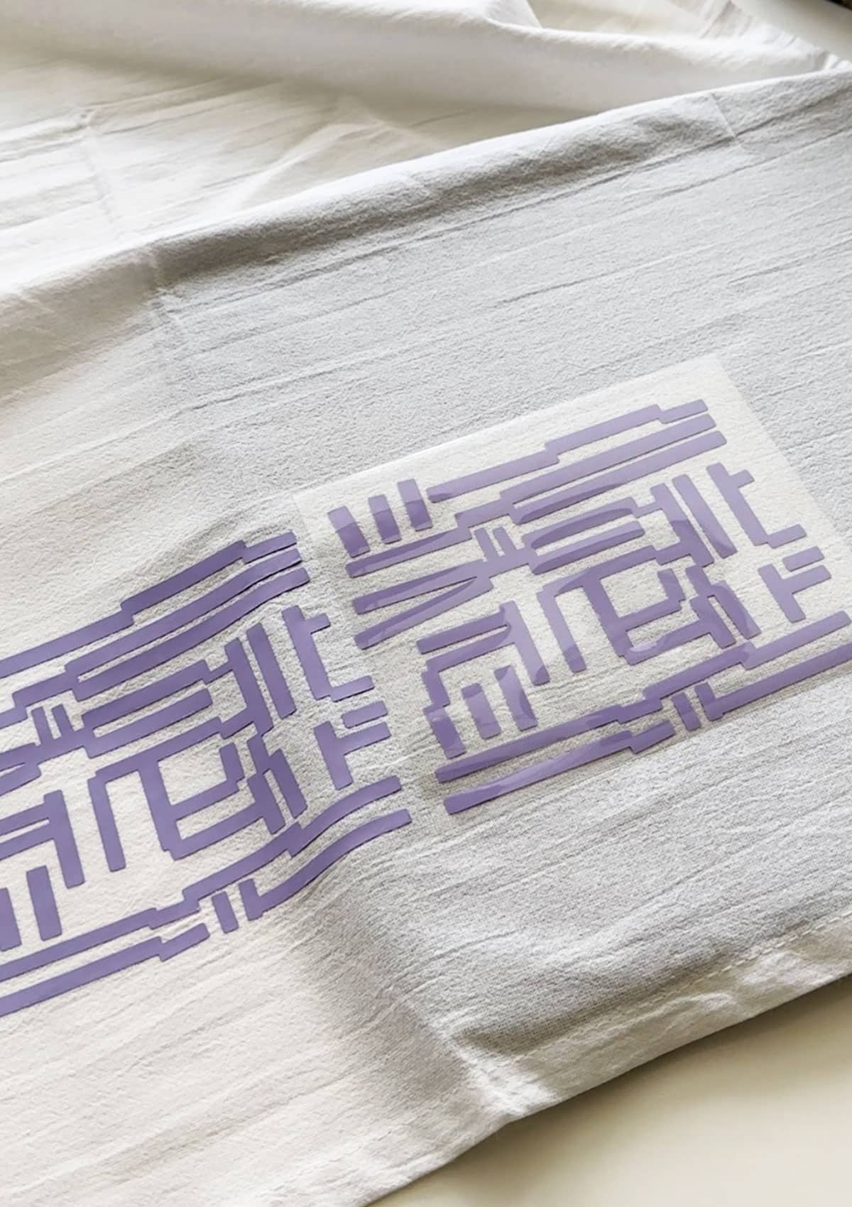 Easy Cricut Project - Make This Modern Tea Towel - Use the Cricut Easy Press to iron on the design to your tea towel