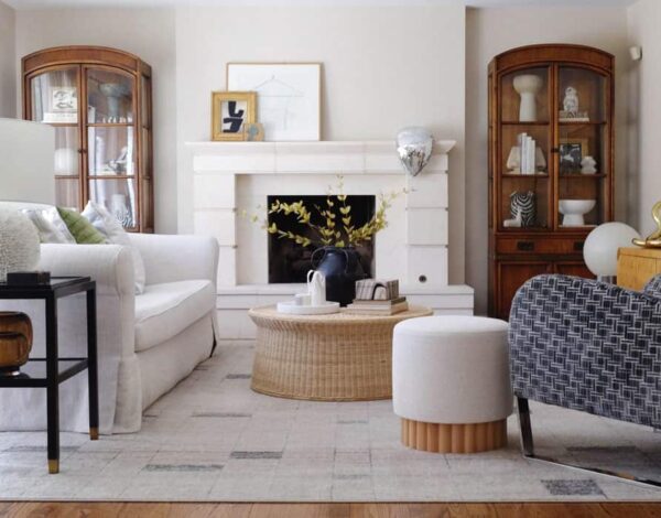 Arranging a Living Room with Fireplace and TV on opposite wall - sharing 5 living room layout options with helpful design tips to help you keep the fireplace as a focal point yet still enjoy the television.