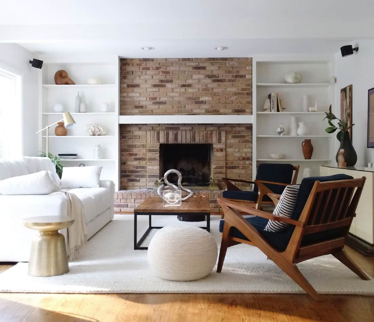 modern living room with brick fireplace