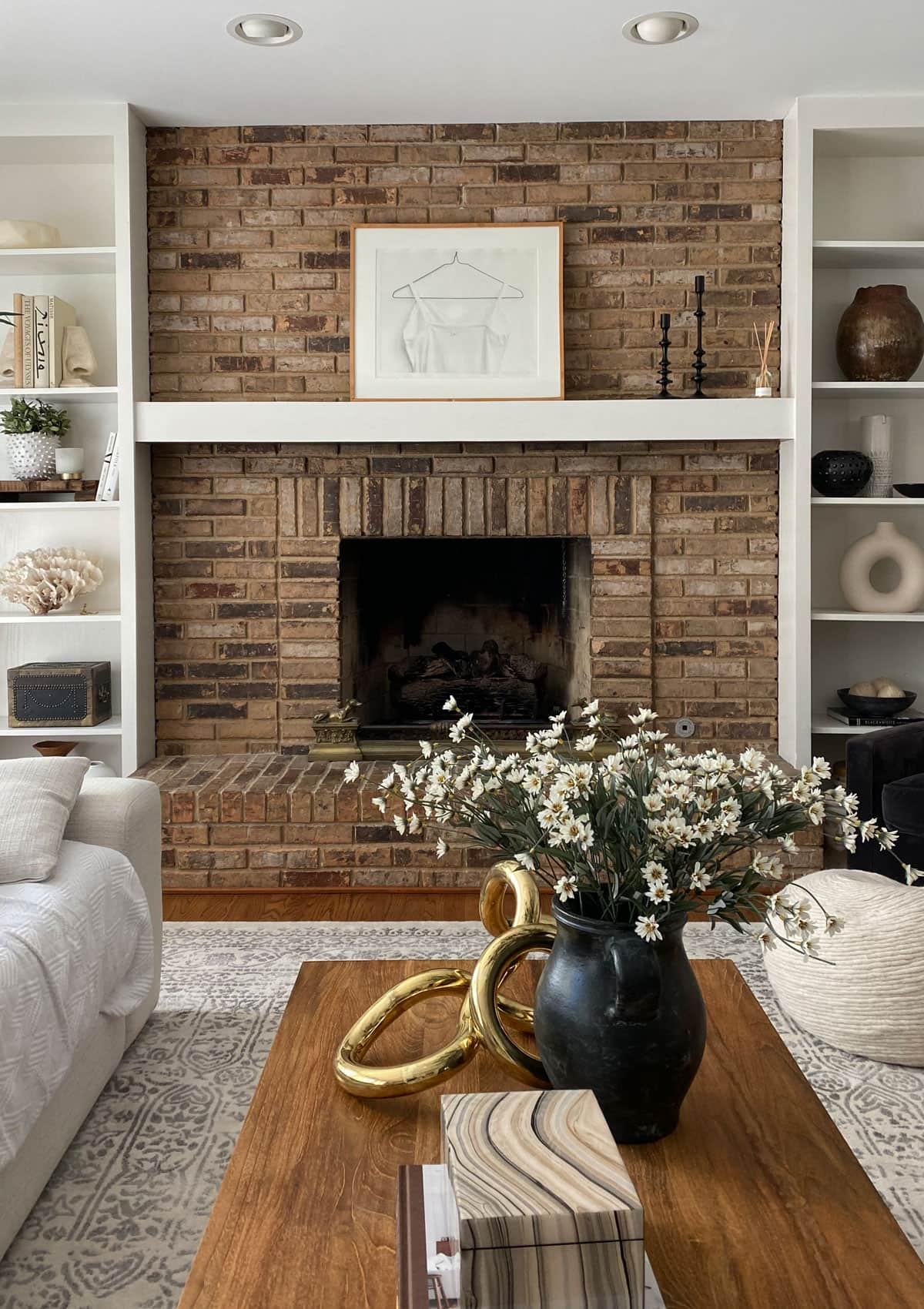 80s Brick Fireplace Before and After How the 80s brick fireplace looked before the fireplace makeover