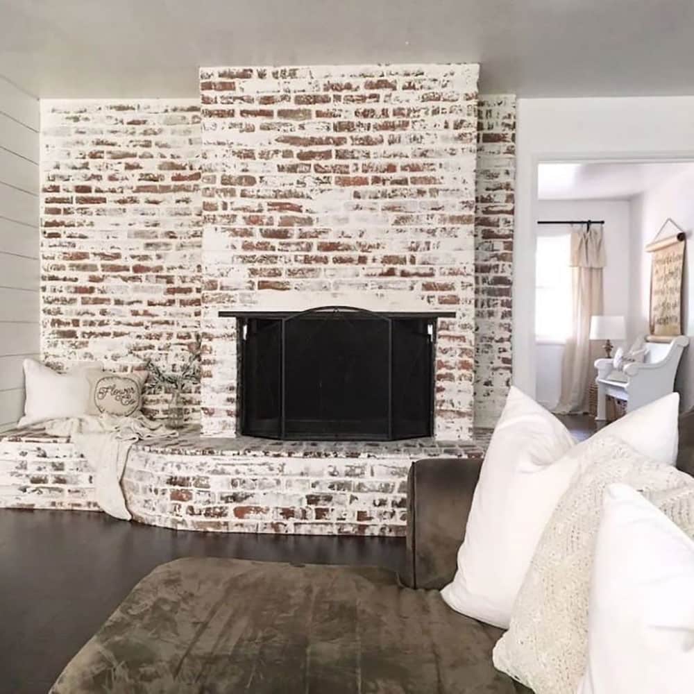 Affordable ideas for a brick fireplace makeover - German smear you can still see the brick through mortar
