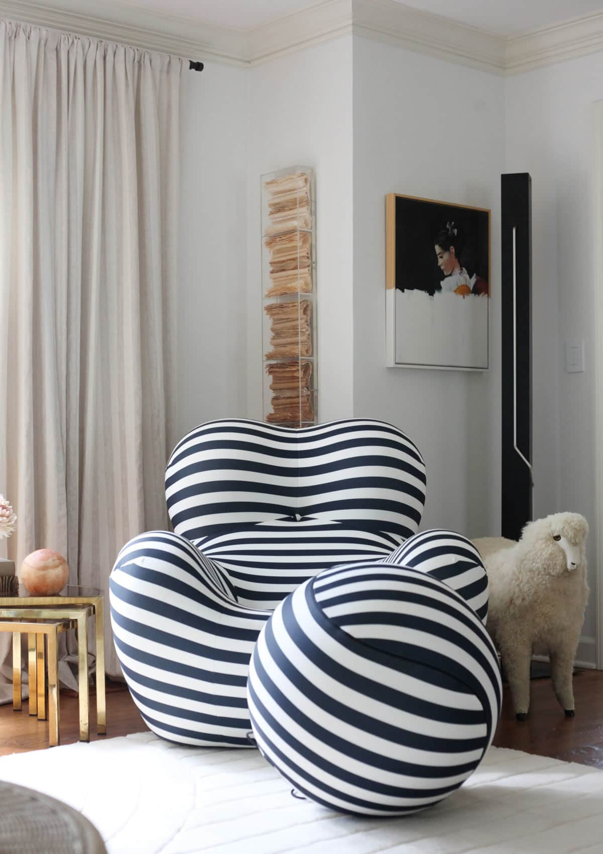 Funky, modern black and white striped chair in living room