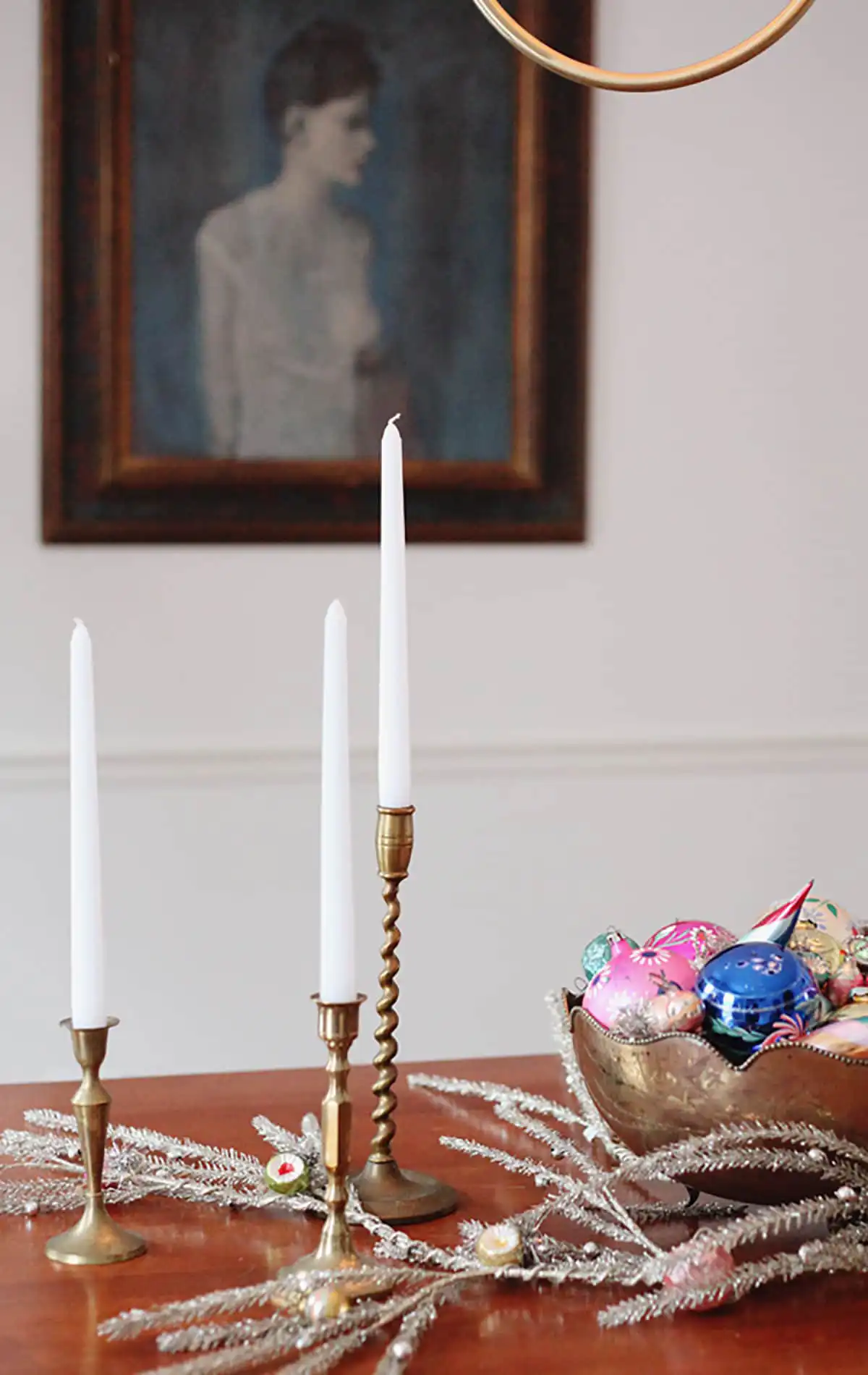 Tacky Christmas decor - style vintage ornaments in a brass bowl for a dining table centerpiece