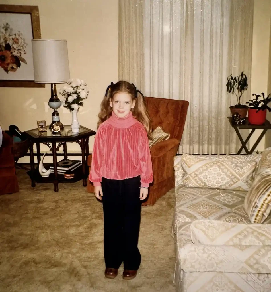 Buying my childhood home - me in the living room as a kid